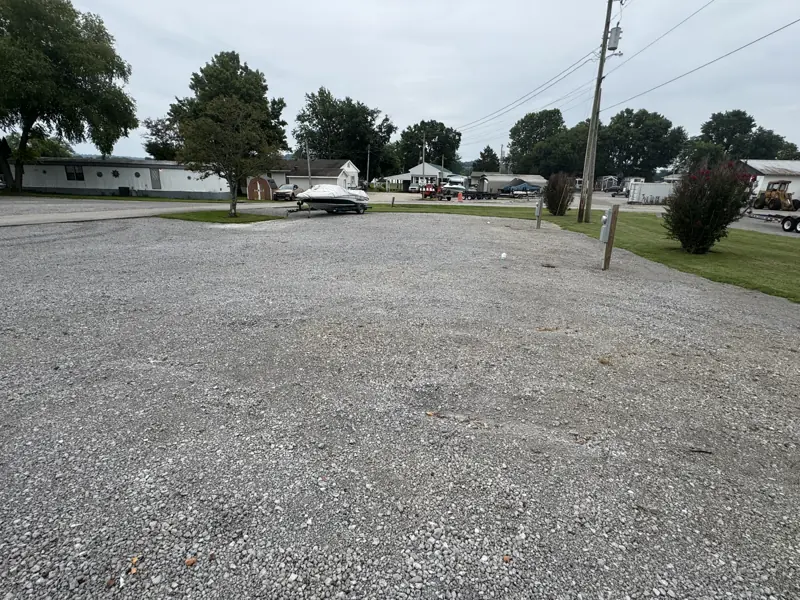 Gravel lot with pedestals, looking toward the road